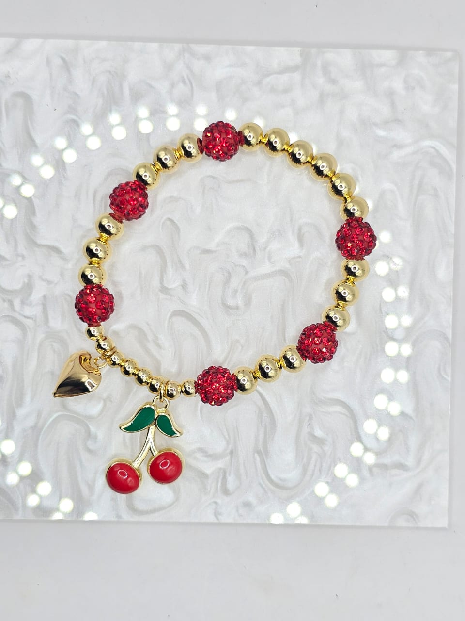 Pulsera de Cerezas disponible en Yaxa Mexico